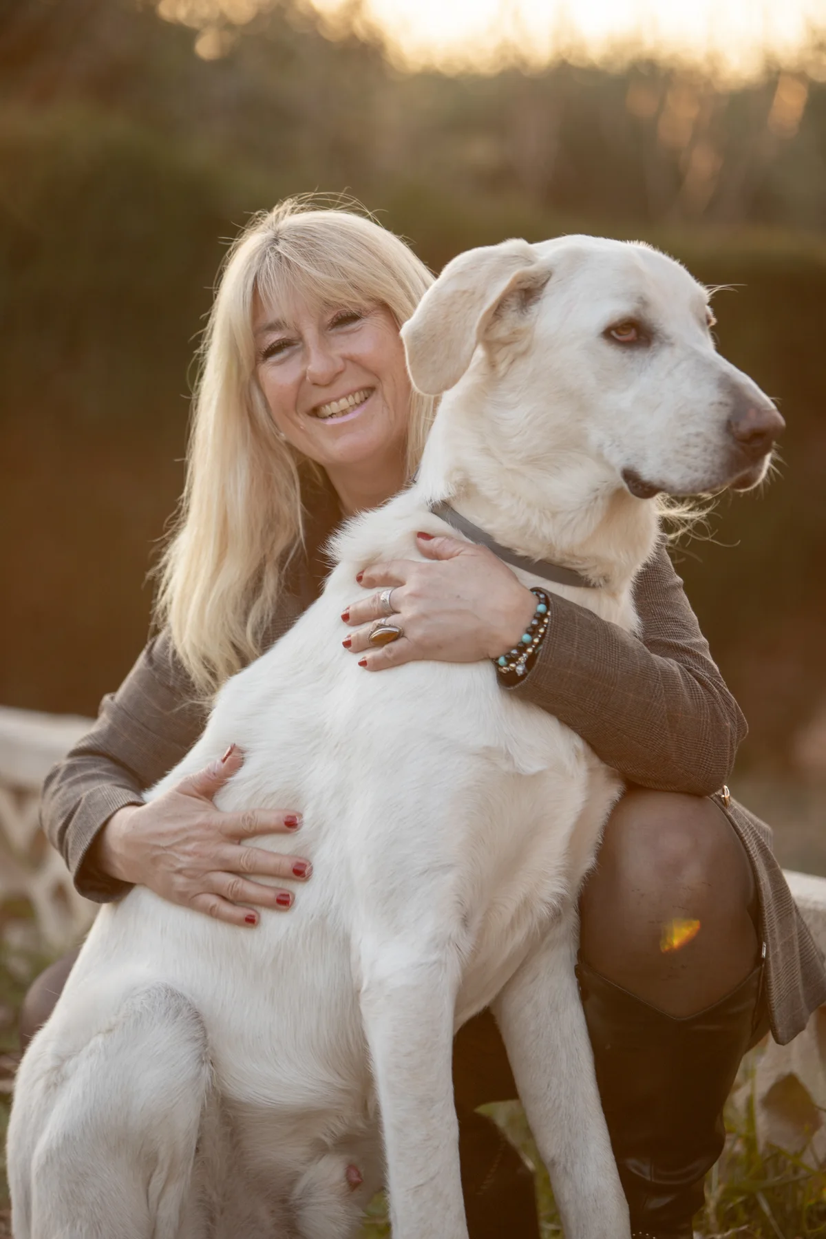 Rachel outdoors with a dog
